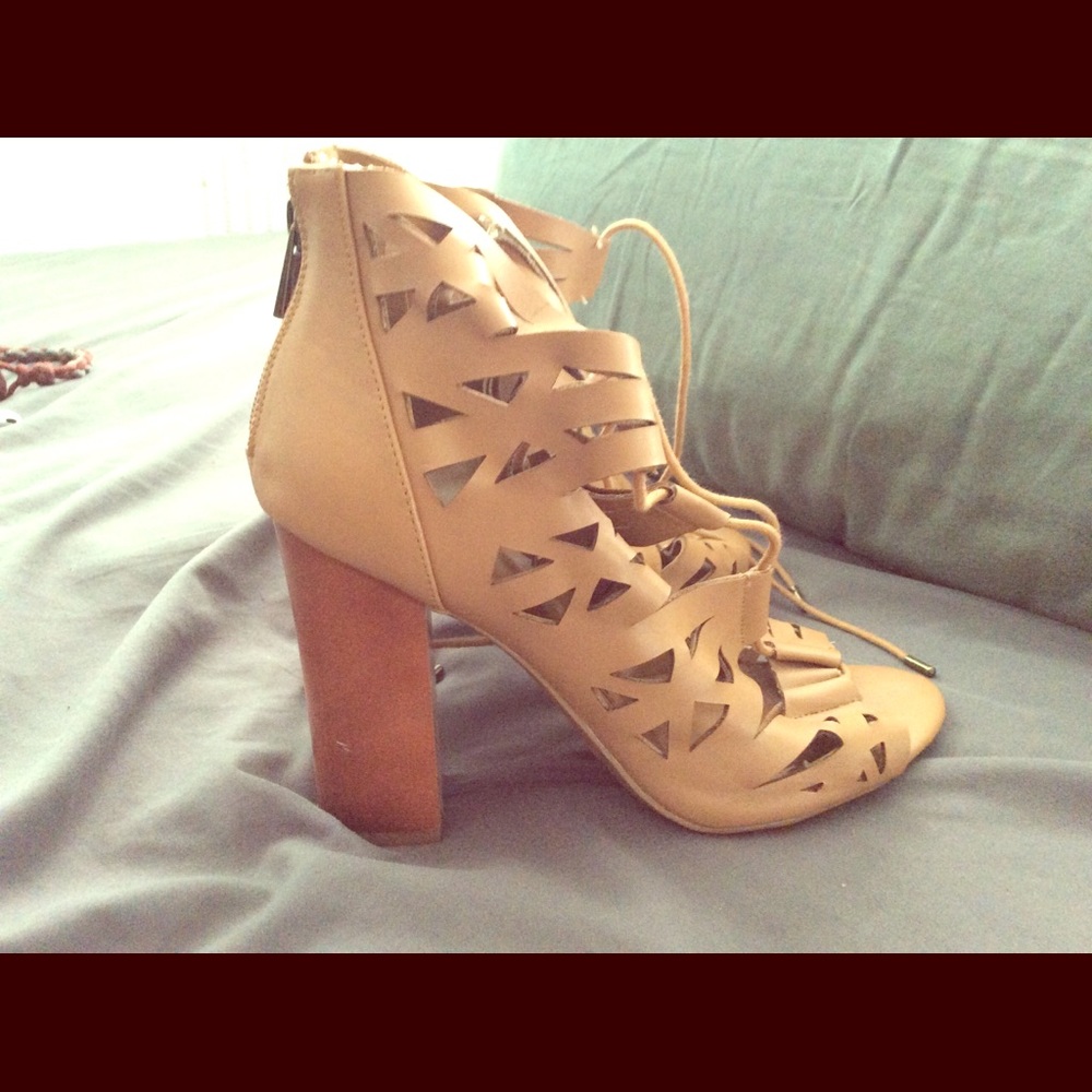 Tan and wooden heel